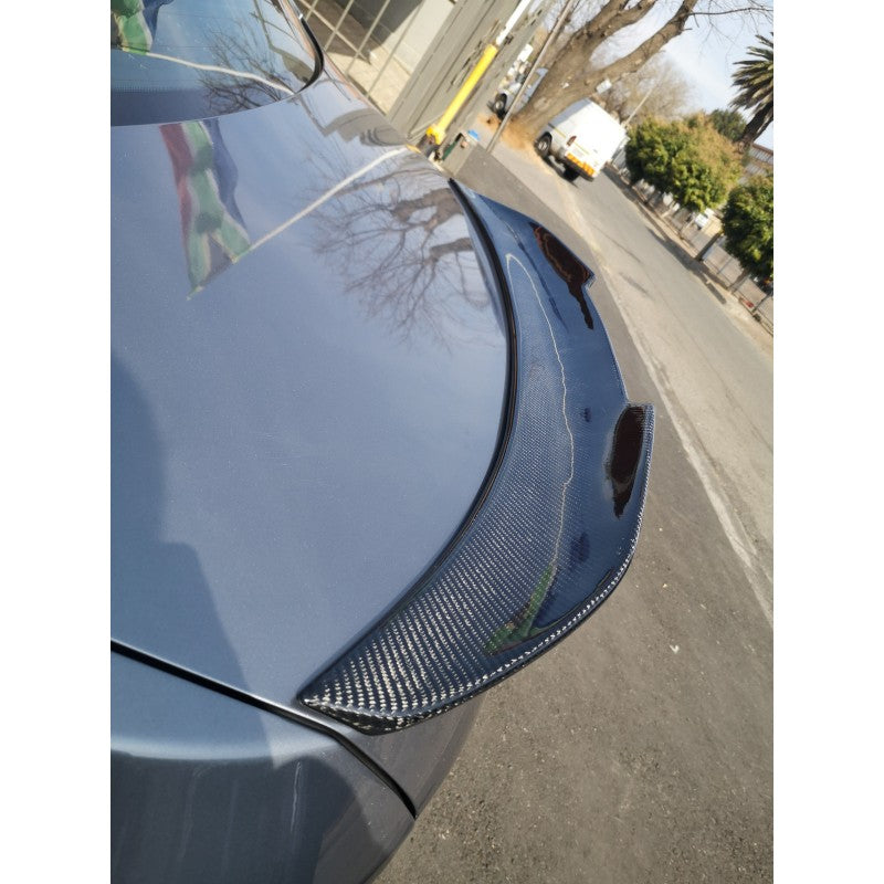 F10 PSM-style carbon fiber boot spoiler