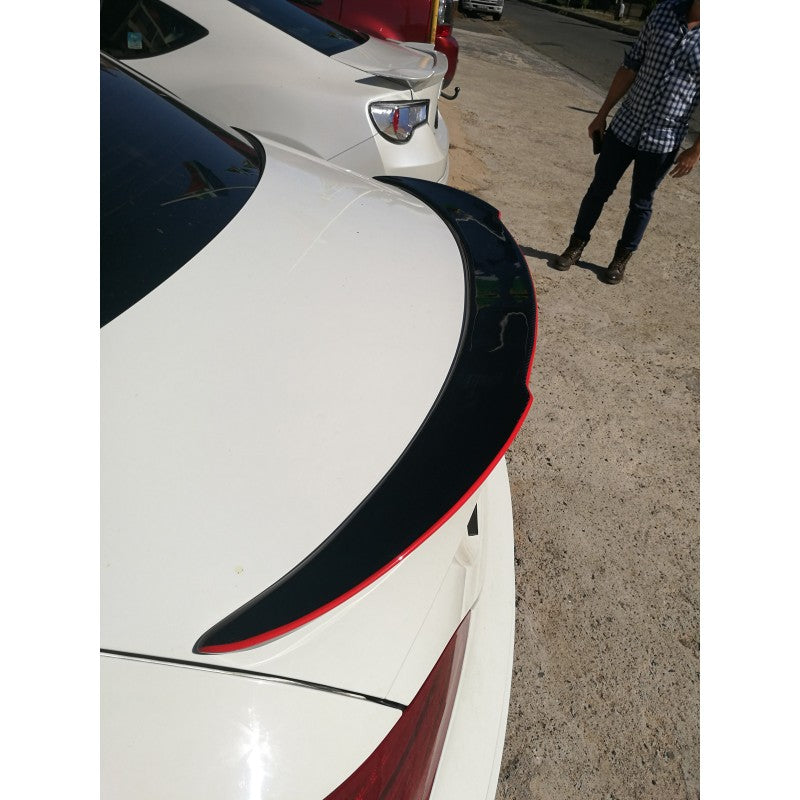 W117 V style carbon fiber boot spoiler w/red trim