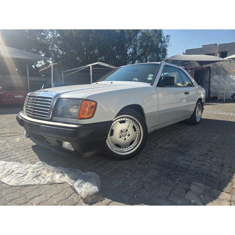 W124 84-95 4D AMG front bumper w/foglamp