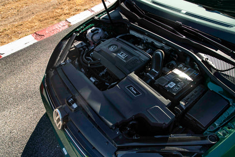 RacingLine R600 intake installed in a Golf engine bay; other accessories shown are separate