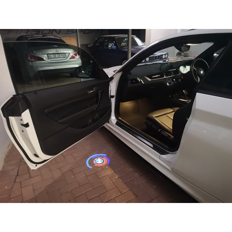 E / F-Series Welcome door light - Anniversary  (upgrade glass Lens)